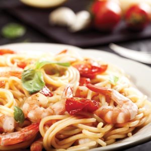 Spaghettis aux tomates séchées, crevettes et citron vert